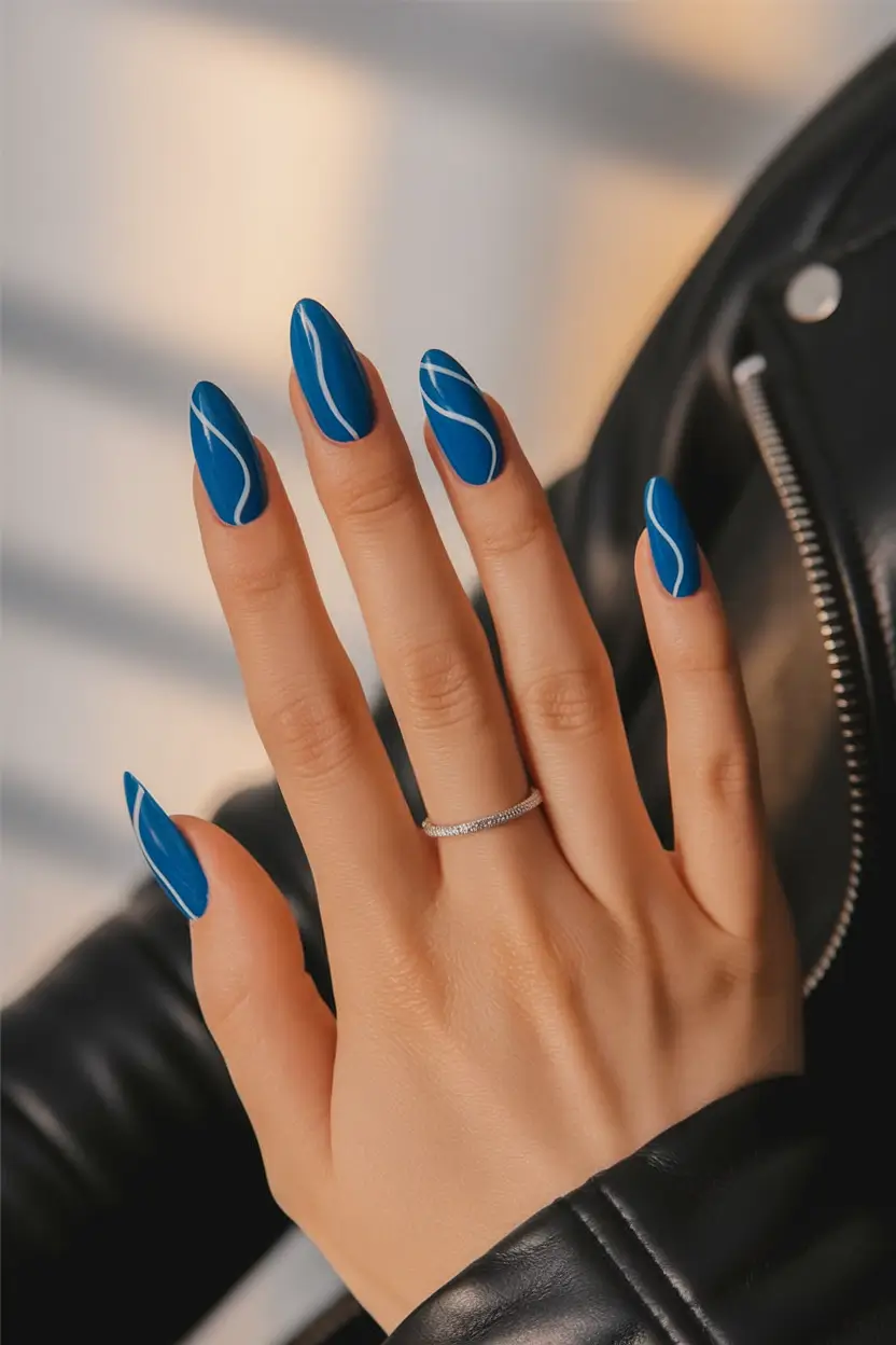 Summer 2025 Nail Designs to Try Blue Waves on Matte Base