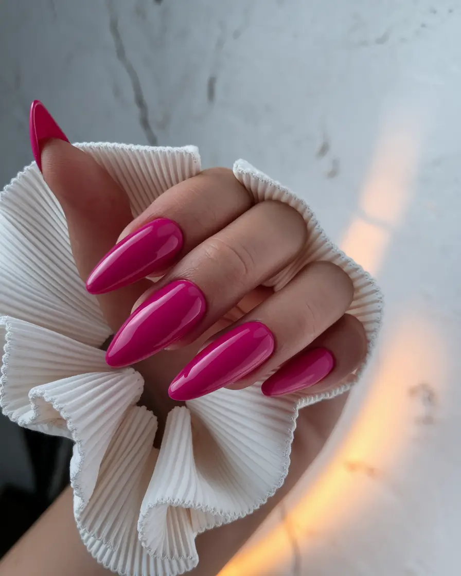 classy summer nails chrome Glossy Magenta Almonds That Glow After Dark