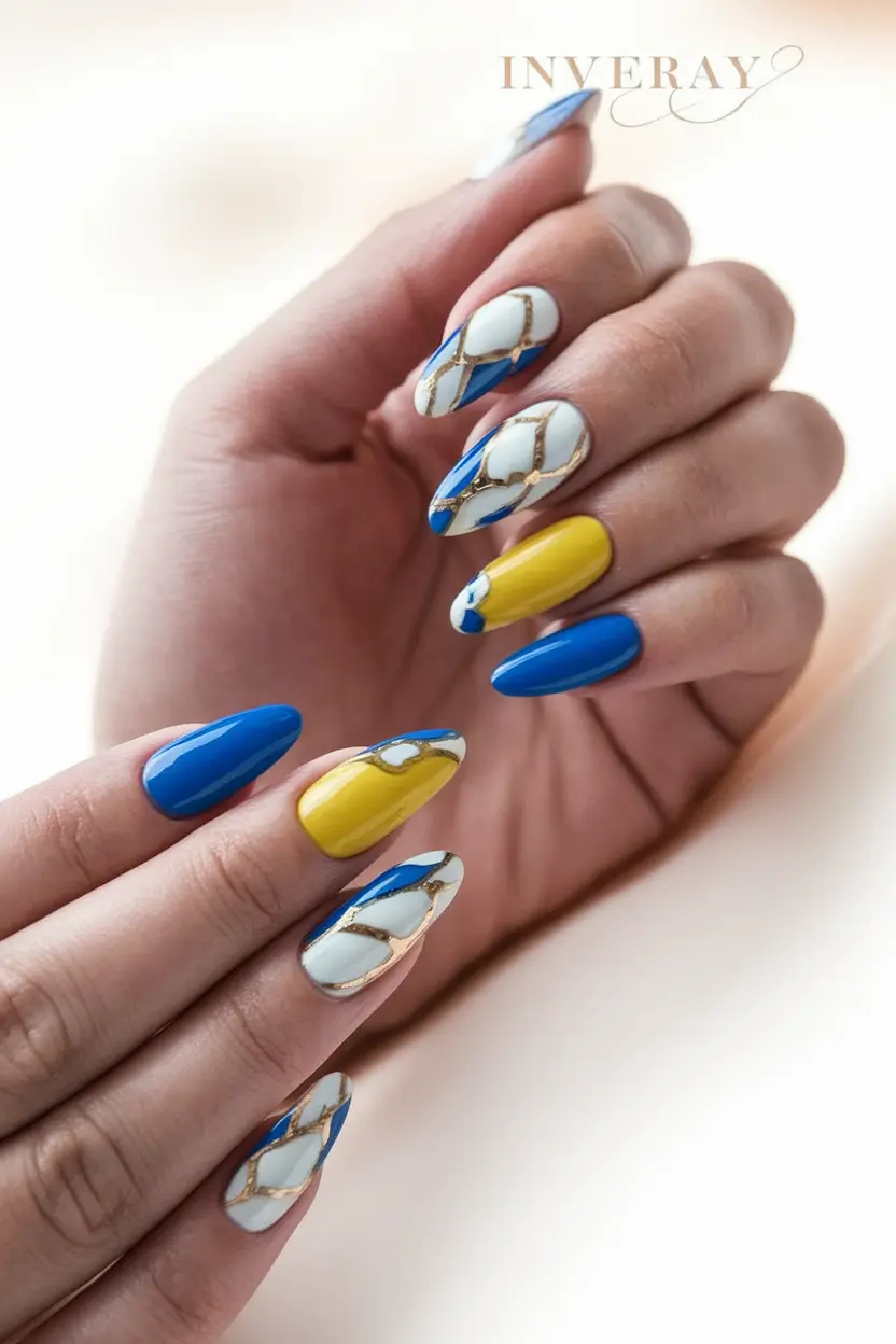 Oval Nail Inspo for Summer 2025 Looks Porcelain Mosaic in Blue and Gold