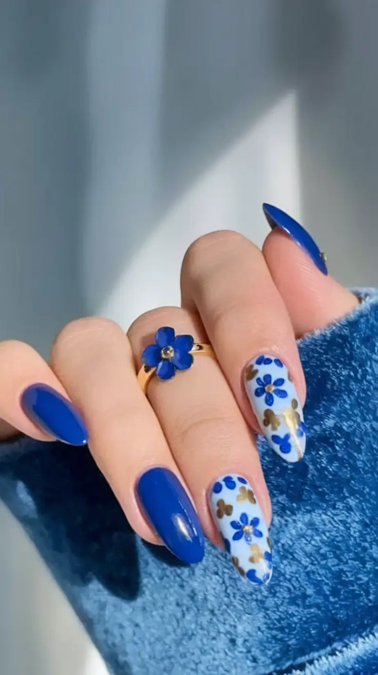 Top Nail Colors for Summer 2025 Royal Blue Florals with a Twist