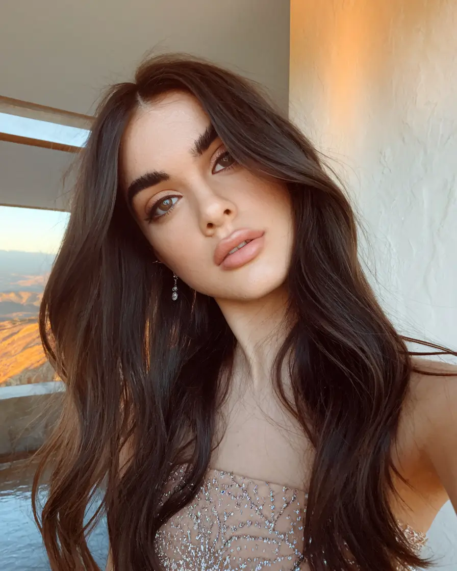 Rich Dark Brown Hair Colors for Fall 2025 Effortless Loose Waves in Dark Auburn Brown