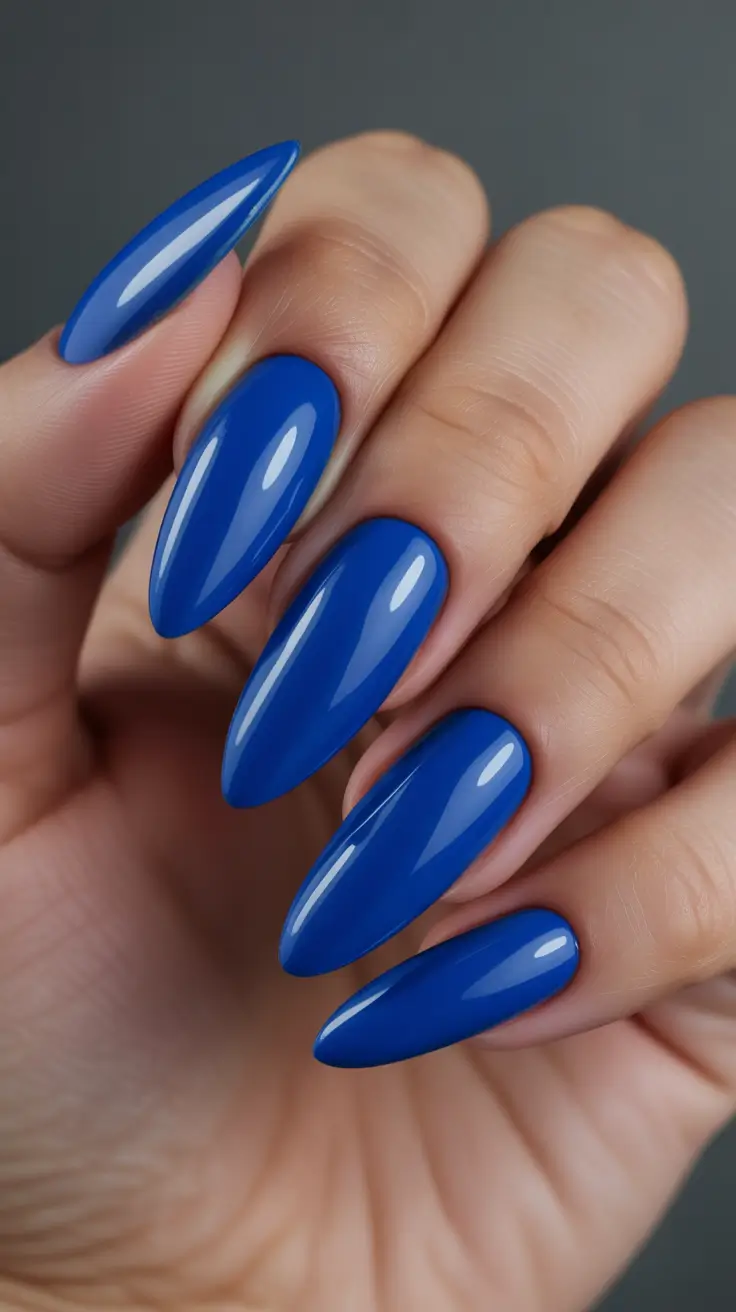 Almond nails and color ideas: winter 2025-2026 Royal Cobalt Power