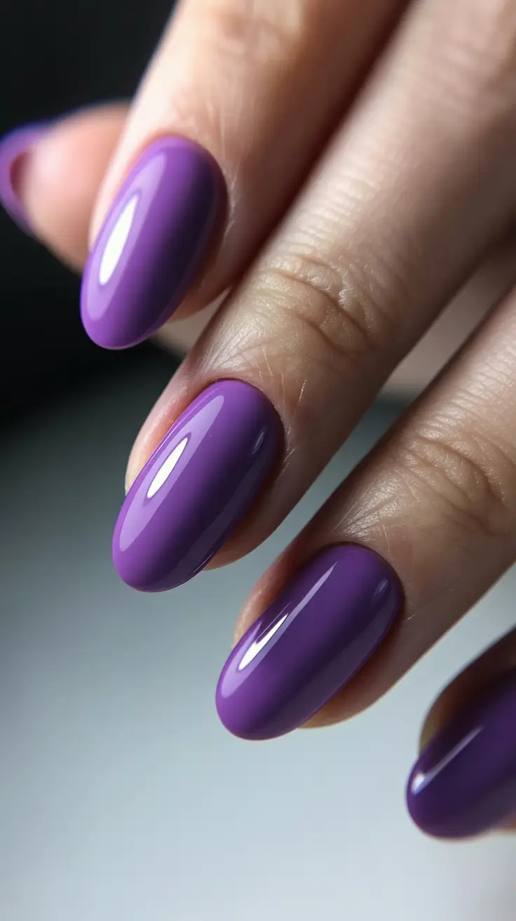 Almond nails and color ideas: winter 2025-2026 Royal Violet Shine