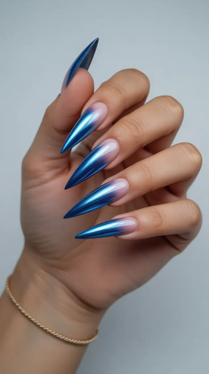 Blue Nail Trends for Winter 2025–2026 Metallic Ice Almond Drama