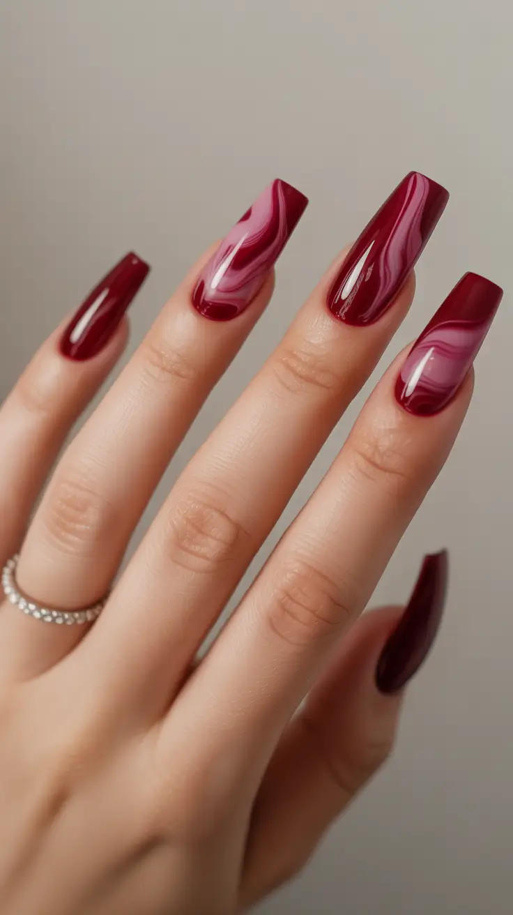 Burgundy Winter Nails Colors 2025–2026 Crimson Marble Flow
