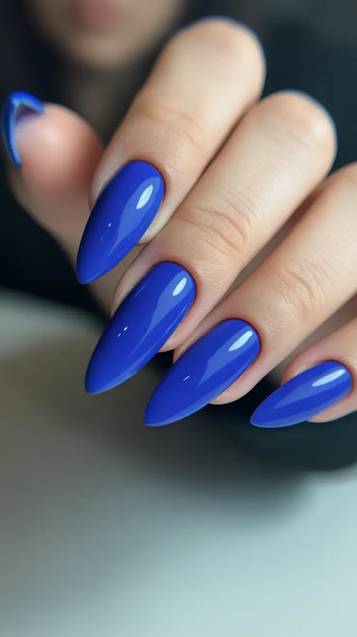 acrylic nail designs 2026 - Electric Cobalt Almond Shine