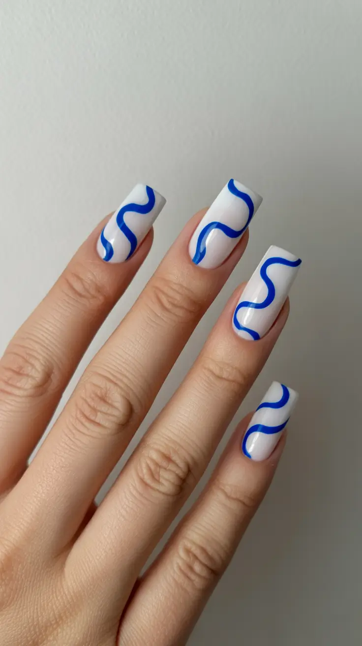 acrylic nail designs 2026 - Blue Waves on Snow White