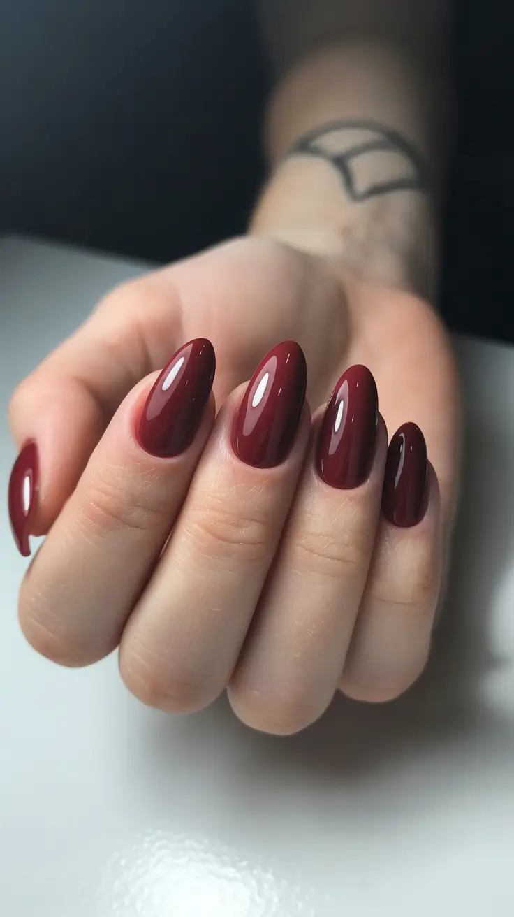 dark burgundy nails 2026 Rounded Berry Red Simplicity