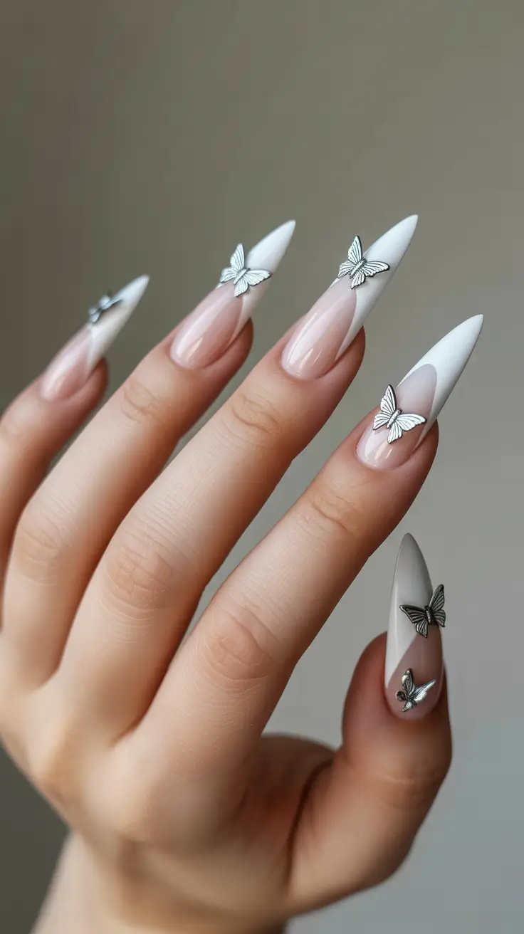 stiletto nails designs White Sculpted Wings with Metallic Butterfly Details