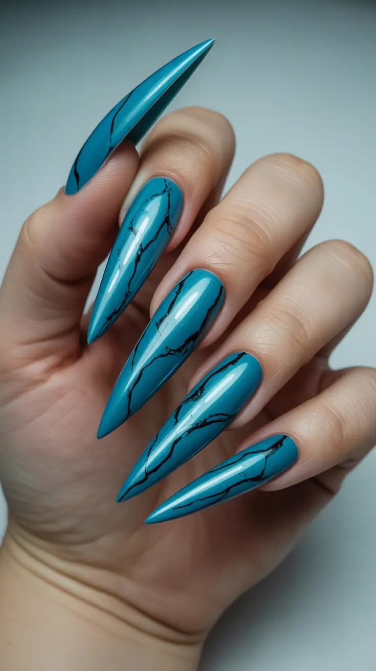 stiletto nails designs Teal Marble Stilettos with Sharp Black Veining