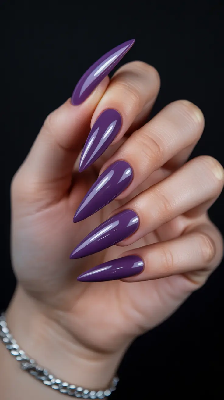 stiletto nails designs Royal Purple Gloss Stilettos with Sculpted Shine