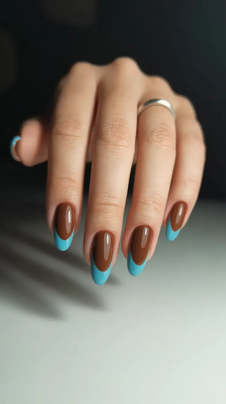 tortoise nails trend 2026 Turquoise French Twist Over Deep Brown