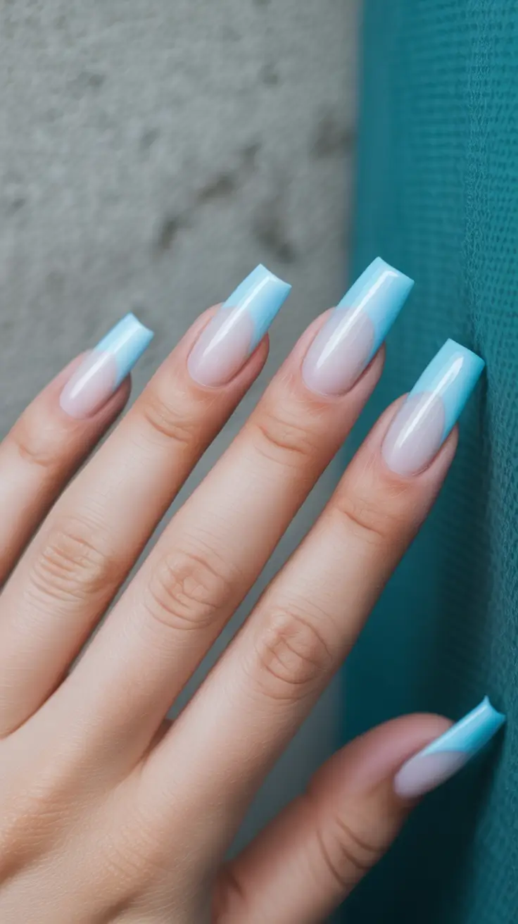 best spring nails coffin 2026 Soft Blue Ombre Coffin Nails with Minimalist Glow