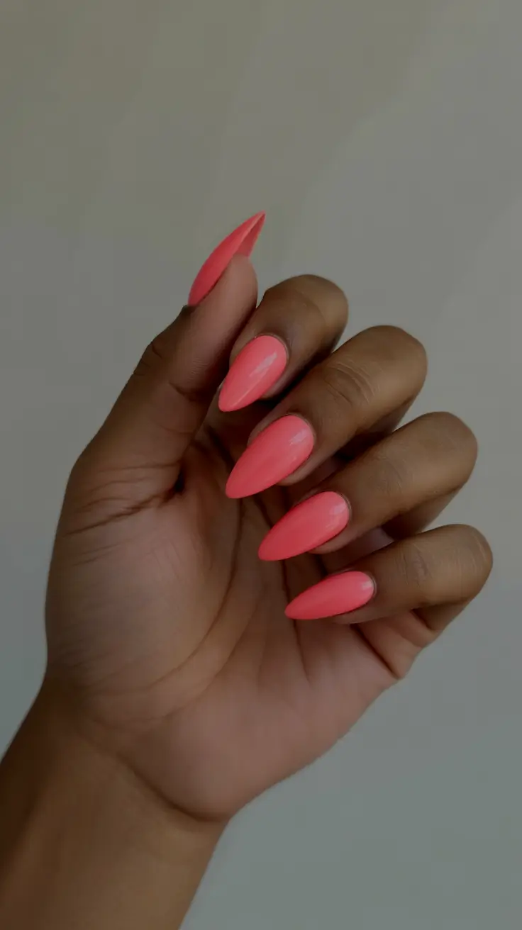 best spring vacation nails 2026 Coral Almond Vacation Statement Nails