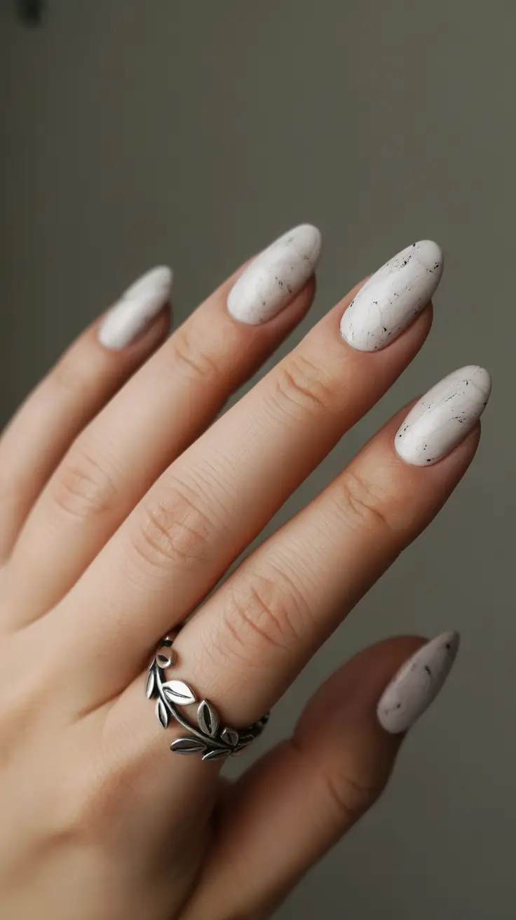 classy spring wedding nails for 2026 Minimal Speckled White Nails with Modern Texture