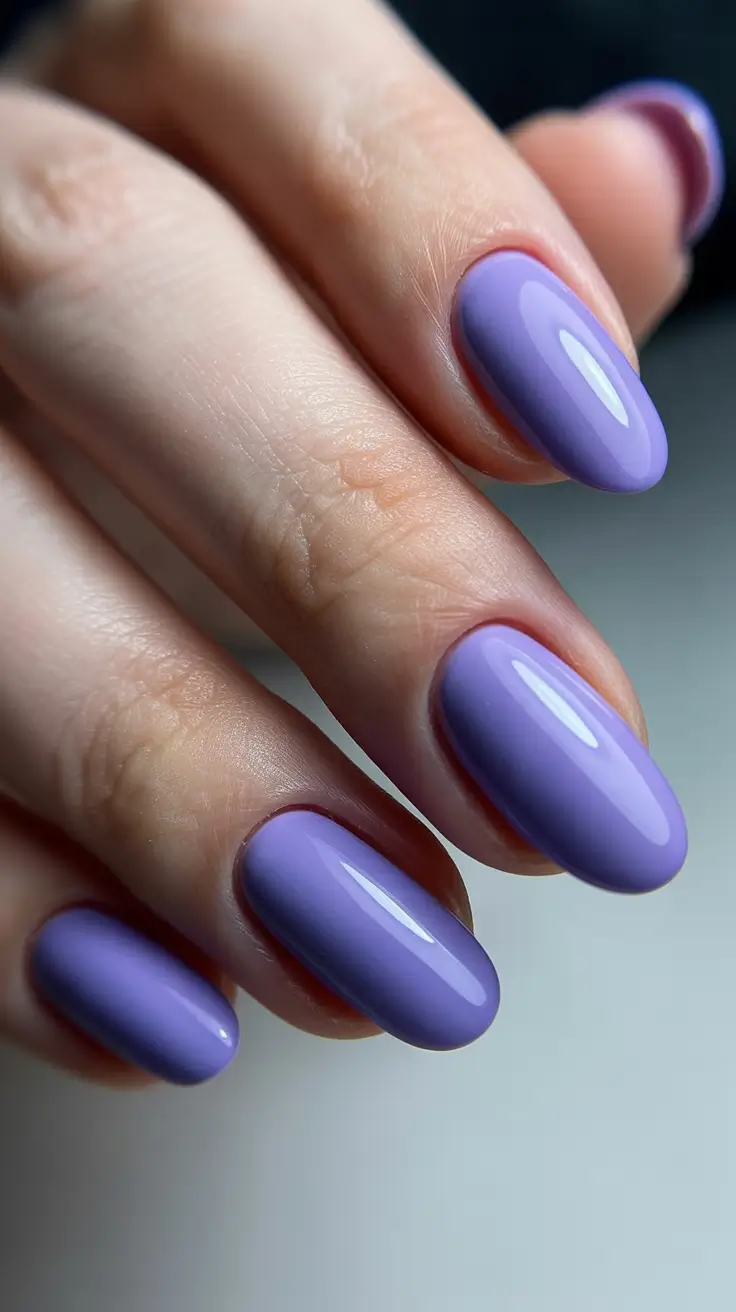 spring nail design 2026 purple almond shape glossy manicure