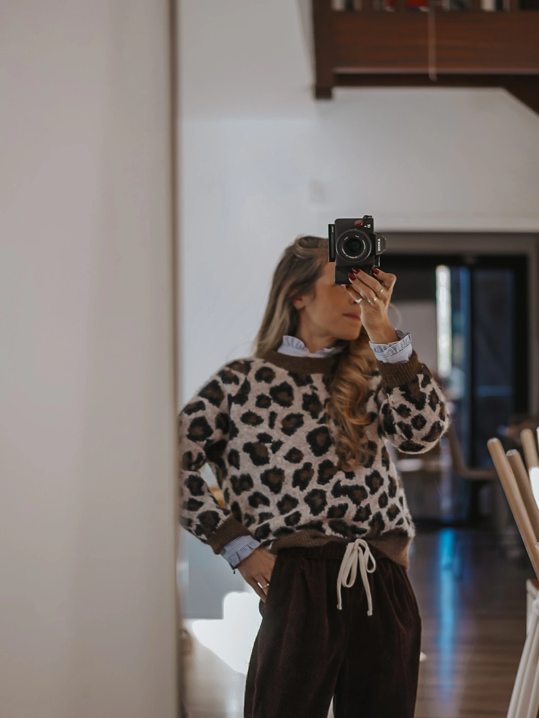 Gray leopard print sweater paired with dark brown drawstring pants